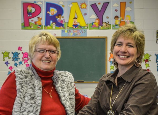 Marian Neff (l), assistant office manager, and Joanne Brown, program manager, help lead the religious education team at Mater Dolorosa and St. Joseph parishes in Butler County. Credit: Jim Judkis