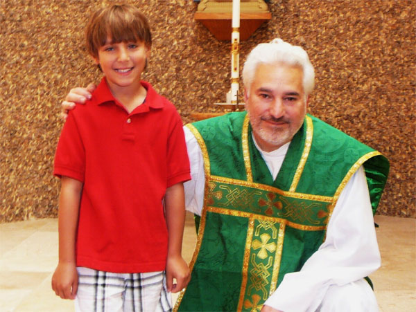 Erik Matthews, with Fr. John Lynam, pastor of Madonna del Castello Parish.